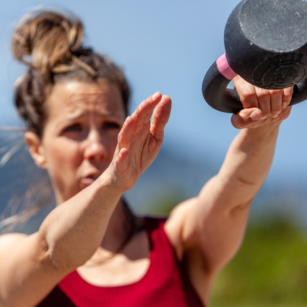 Angie Degeronimo uses a kettle bell in Palo Alto